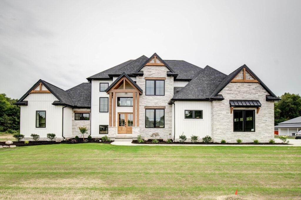 Elegant modern farmhouse featuring lightweight stone veneer